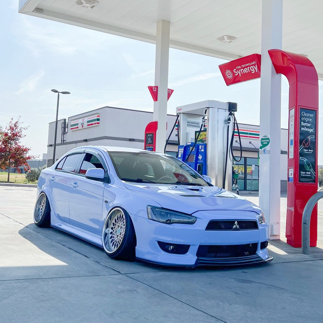 Soft Gloss Pastel Blue Vinyl Wrap on Front Shot of Mitsubishi Lancer